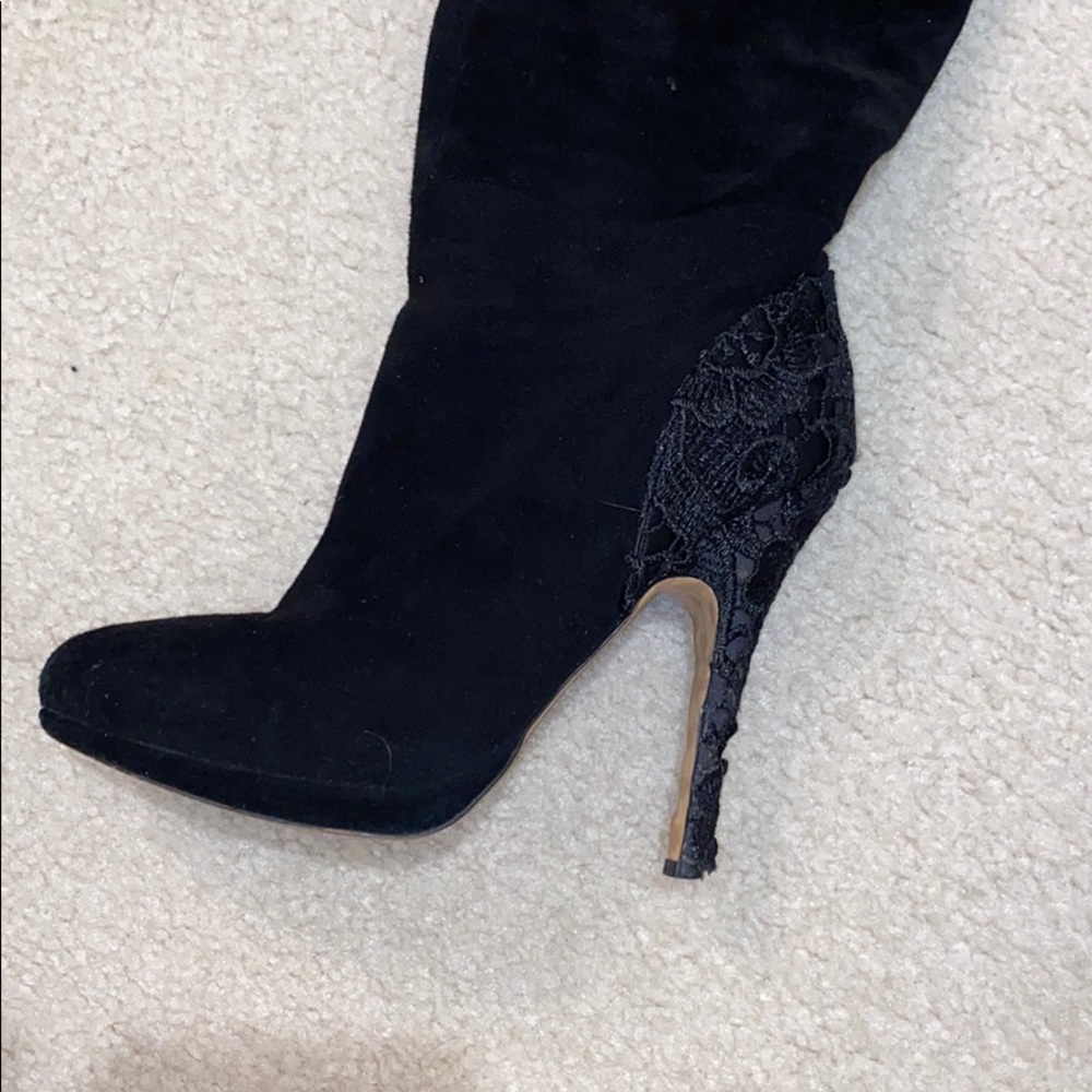 Black knee high boots with black lace